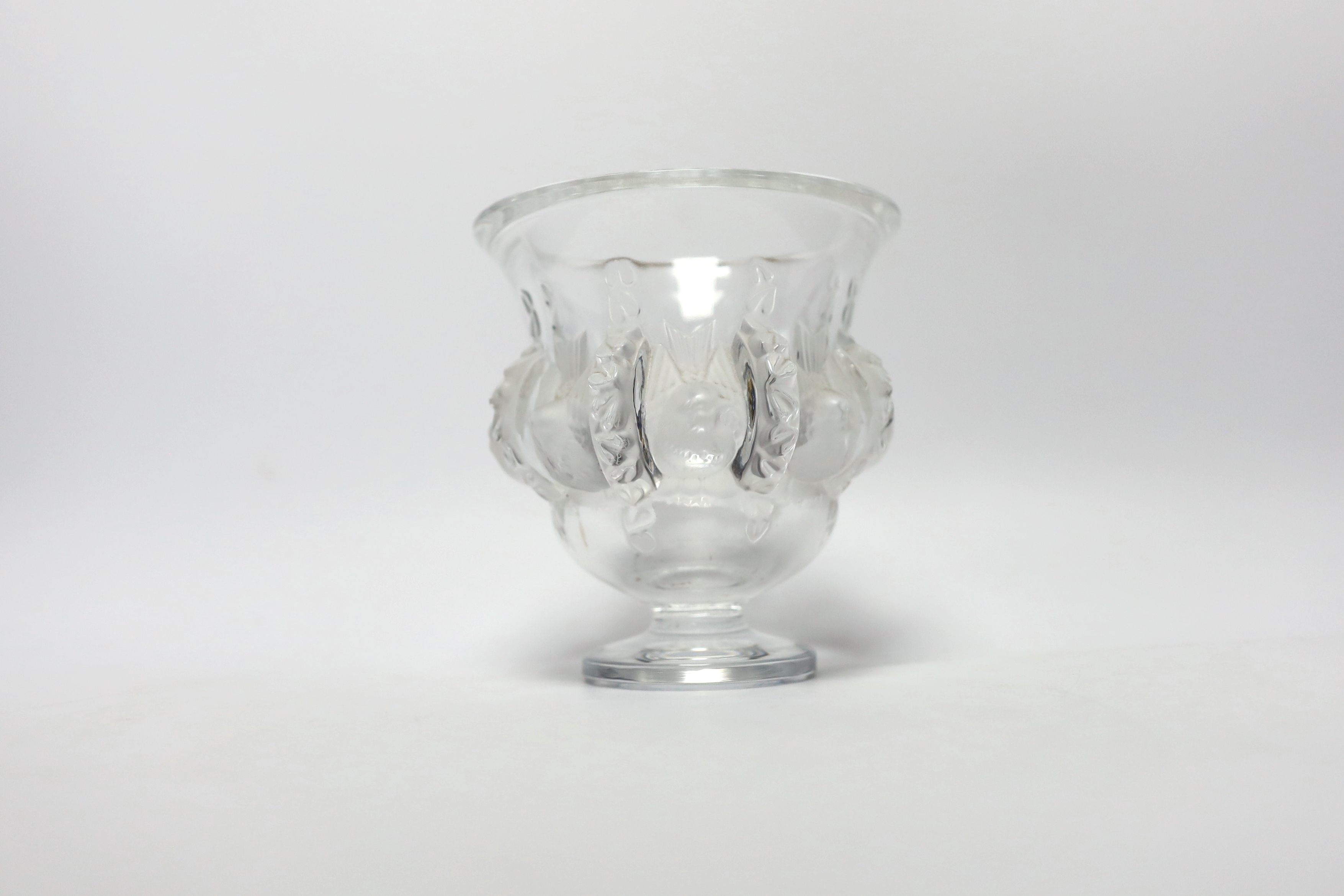 A later 20th century Lalique glass pedestal vase decorated in the Dampierre pattern, engraved signature ‘CM Lalique’, 13cm